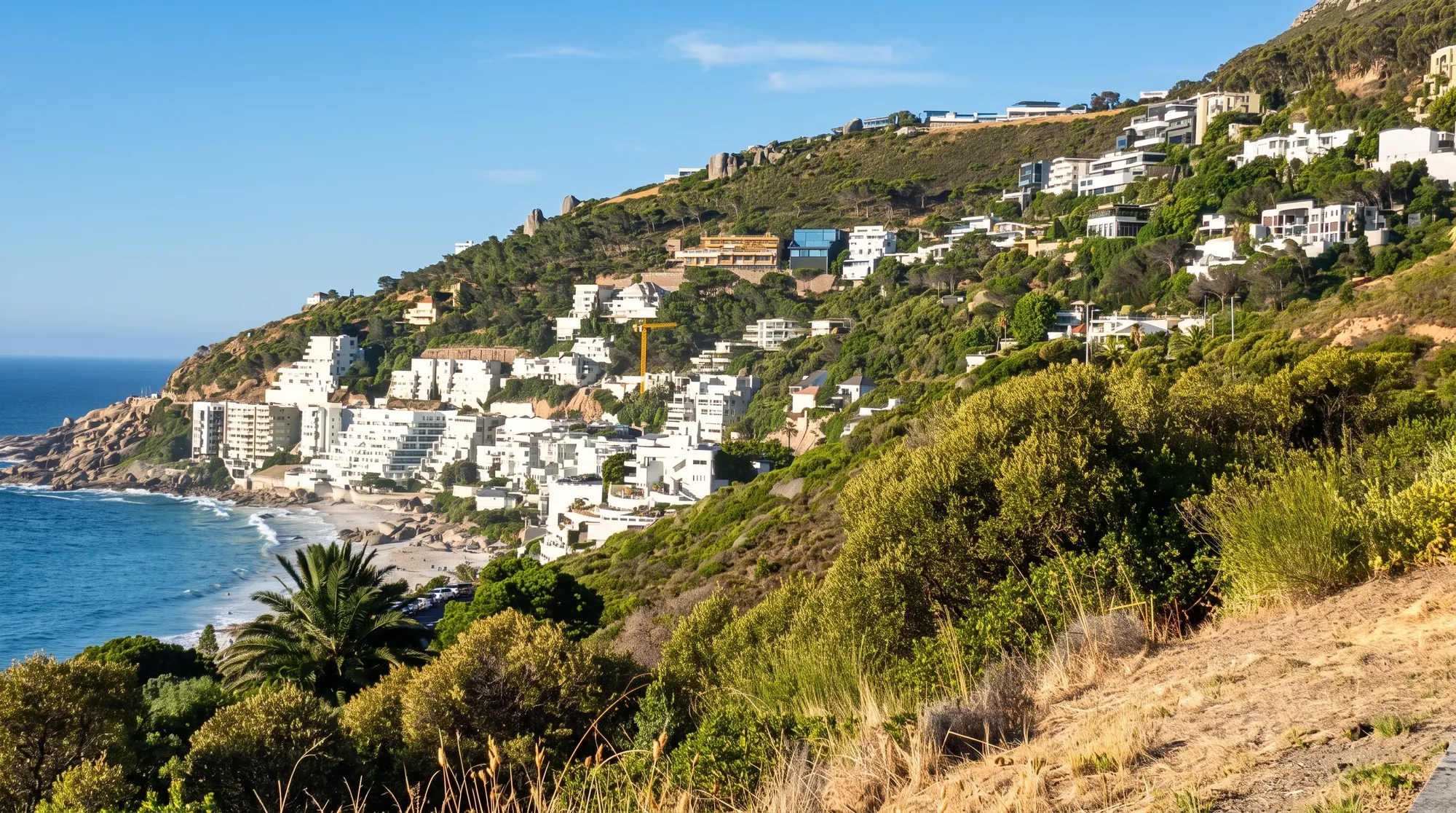 White houses on a steep coastal hillside